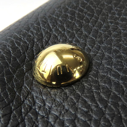 Close-up of LOUIS VUITTON Pre-Owned bag hardware with gold finish and embossed logo detail