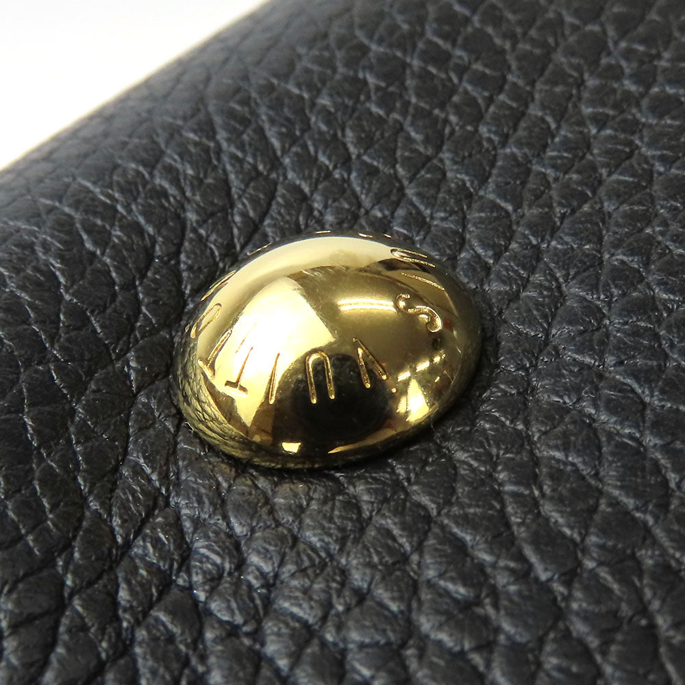 Close-up of LOUIS VUITTON Pre-Owned bag hardware with gold finish and embossed logo detail