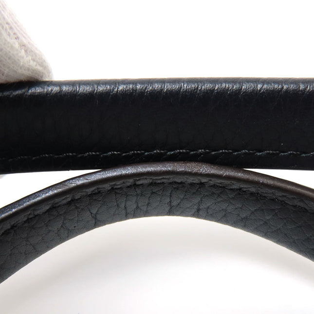 Close-up of a pre-owned Louis Vuitton bag showcasing its durable leather and stitching details