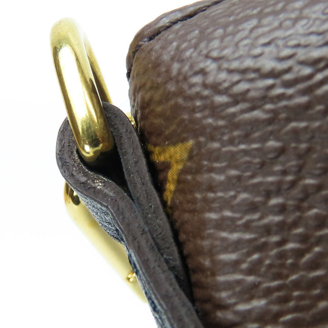 Close-up of a LOUIS VUITTON bag showing gold hardware, highlighting its pre-owned quality
