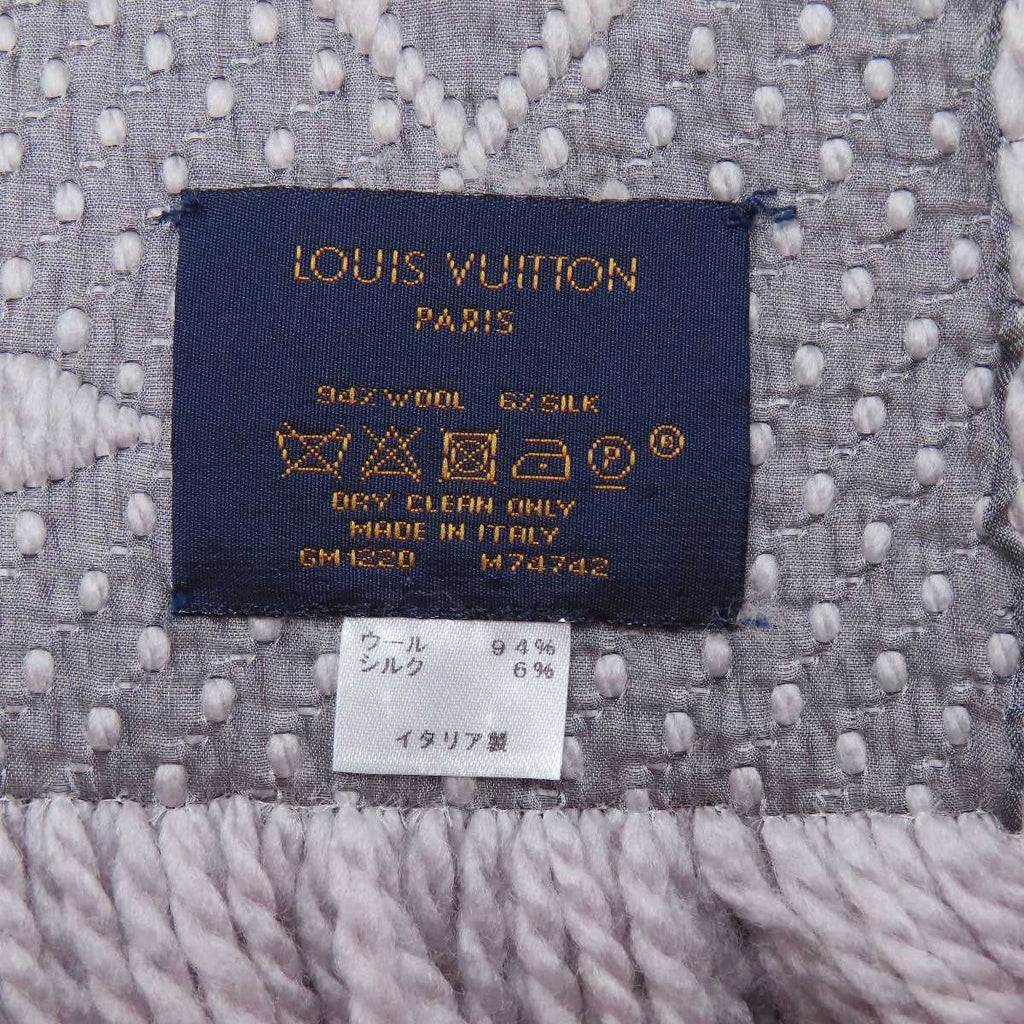 Pre-owned Louis Vuitton wool scarf label showing dry clean only, made in Italy care instructions