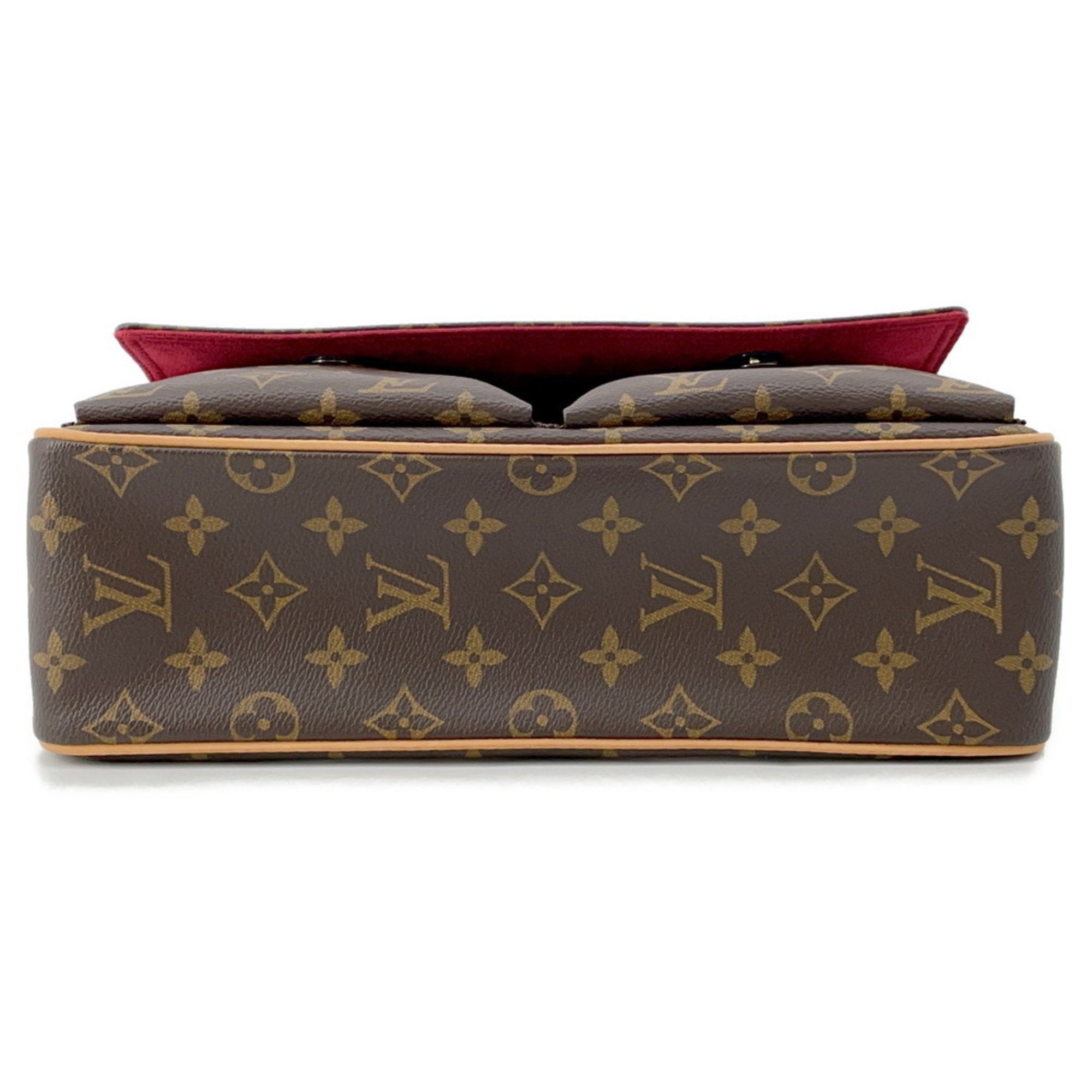 MANSII Louis Vuitton Cosmetic Pouch used like new with iconic monogram design and red interior