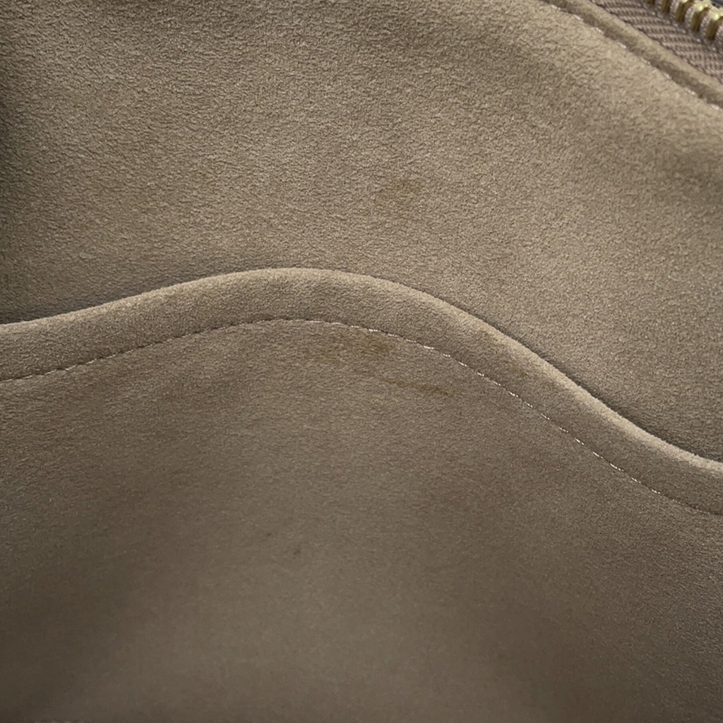 Interior view of LOUIS VUITTON used Petit Palais PM showing soft suede lining and zipper detail