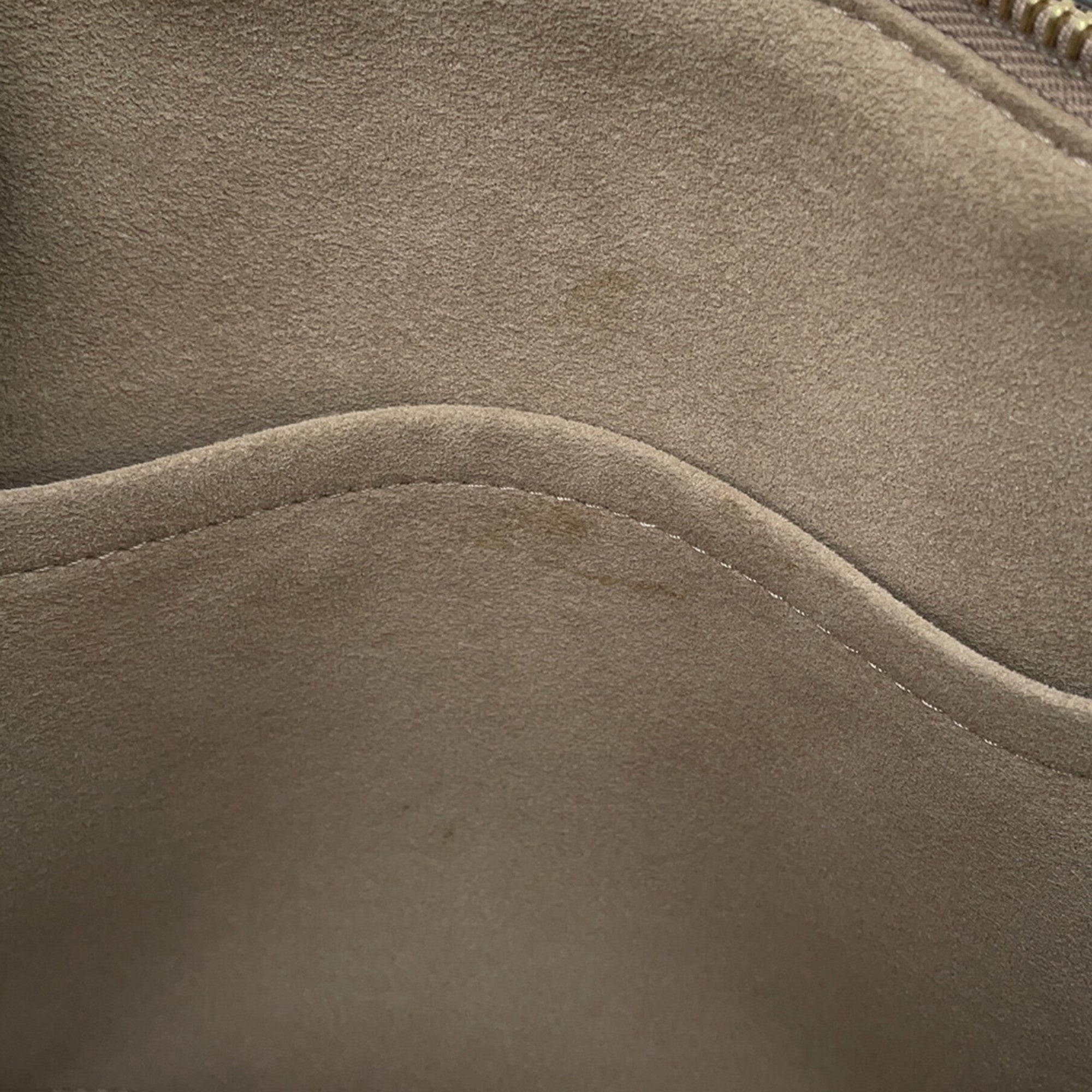 Interior view of LOUIS VUITTON used Petit Palais PM showing soft suede lining and zipper detail