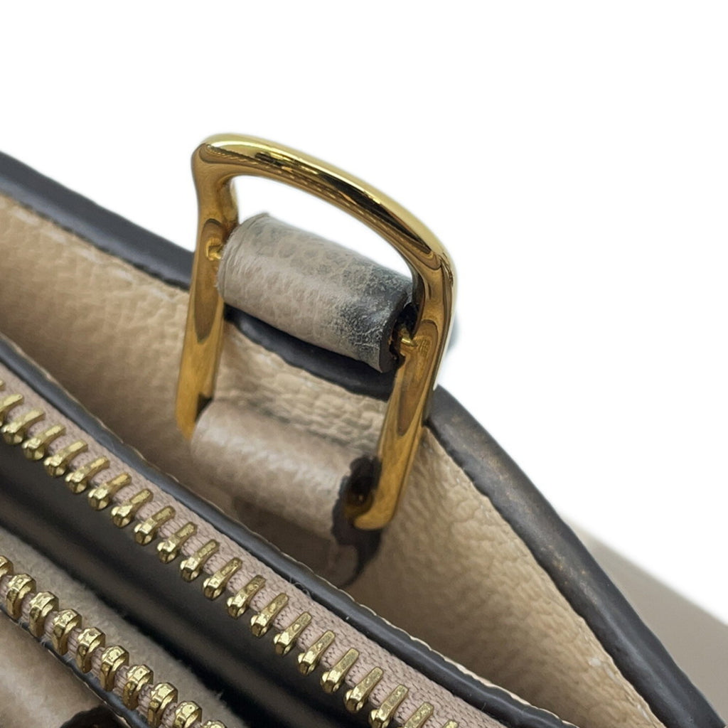 Close-up of LOUIS VUITTON used Petit Palais PM inner zipper and strap detail