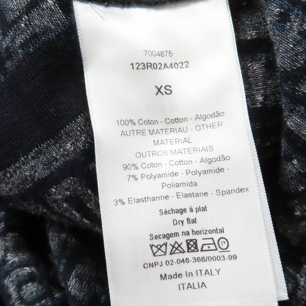 Care label of luxury secondhand Dior womenswear showing fabric composition and care instructions