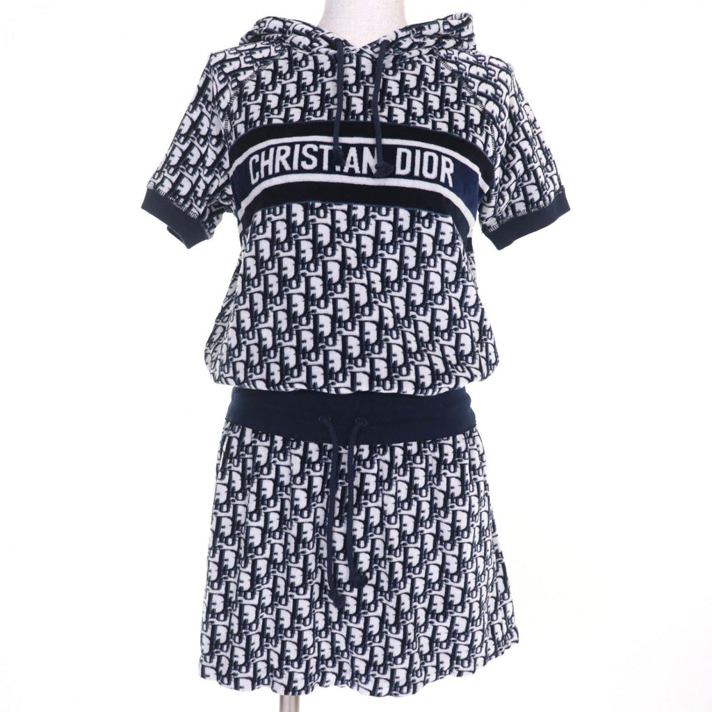 Christian Dior hoodie and skirt set showcasing luxury secondhand Dior womenswear in a chic design