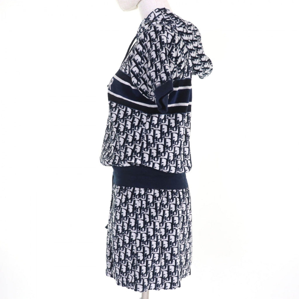 Luxury secondhand Dior womenswear featuring a stylish hoodie and skirt set with logo pattern