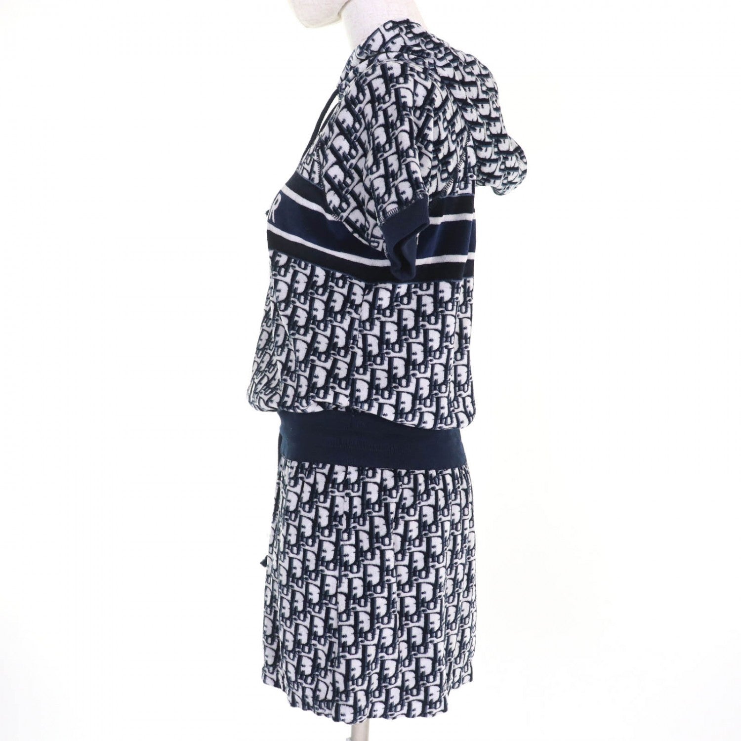 Luxury secondhand Dior womenswear featuring a stylish hoodie and skirt set with logo pattern