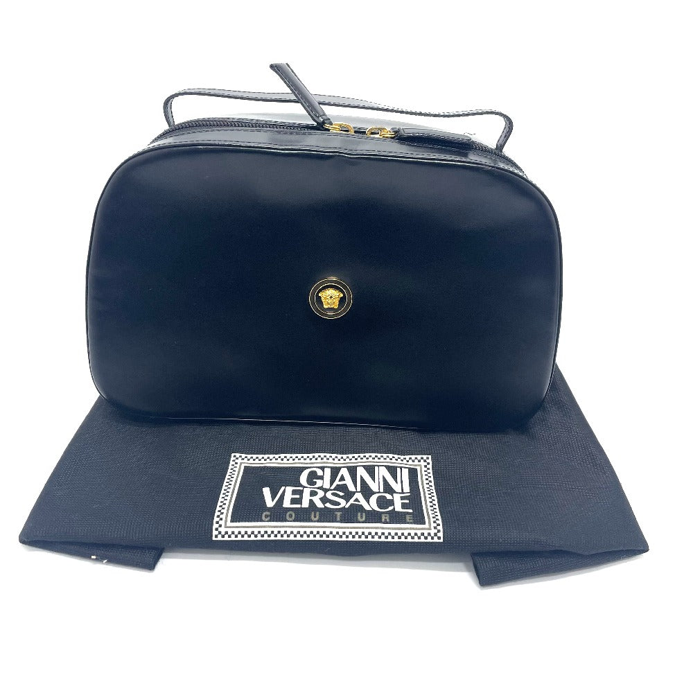 Luxury vintage Versace purse in black with gold hardware and iconic logo detail