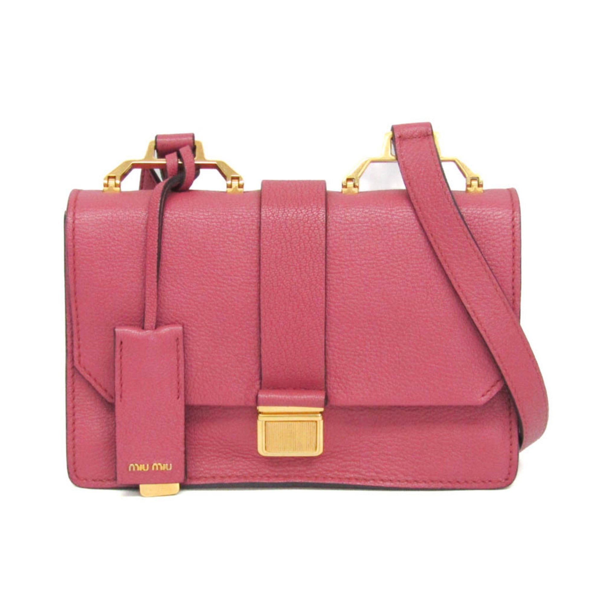 MIU MIU Pre-Loved MADRAS shoulder bag in vibrant pink leather with gold accents and a detachable strap