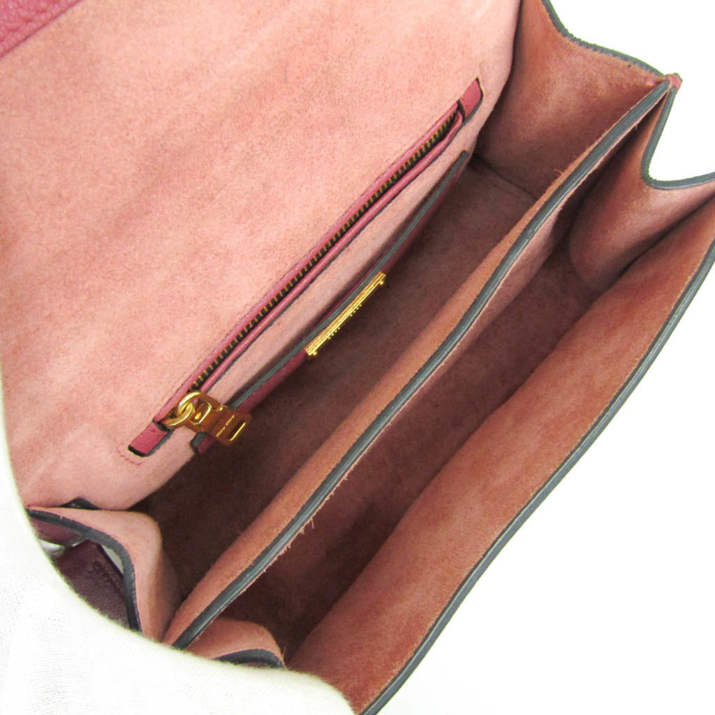 MIU MIU Pre-Loved MADRAS shoulder bag interior design with zip pocket and spacious compartments