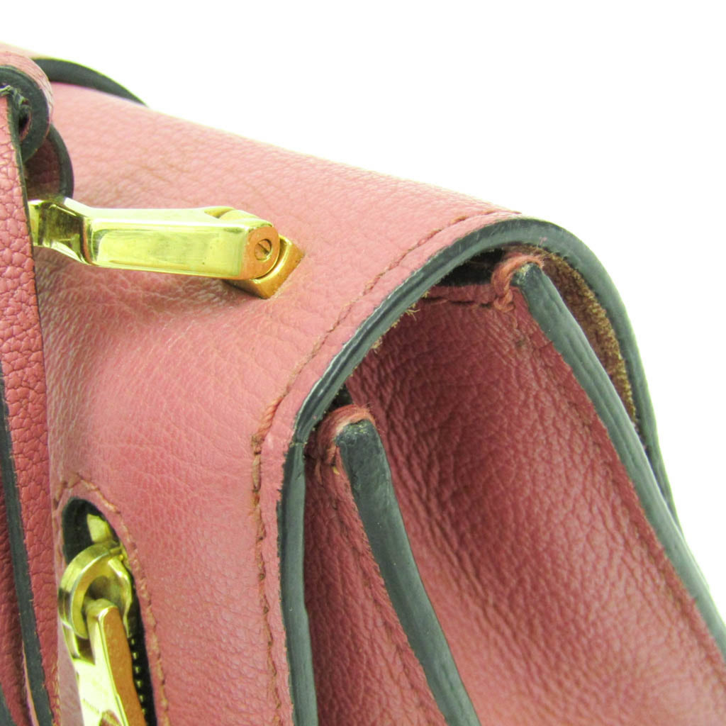 Close-up of MIU MIU Pre-Loved MADRAS shoulder bag highlighting the textured leather and gold-tone hardware