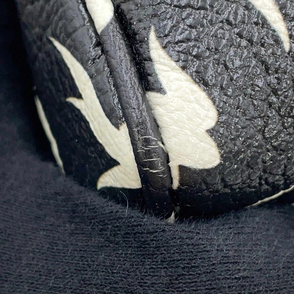 MANSII MIU MIU Pre-Loved Swallow Pattern Bag showcasing unique design and detail on the strap