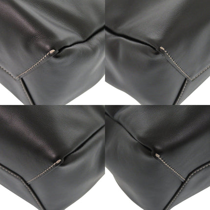 Pre-owned MIU MIU leather bag featuring unique stitching and a classic design.
