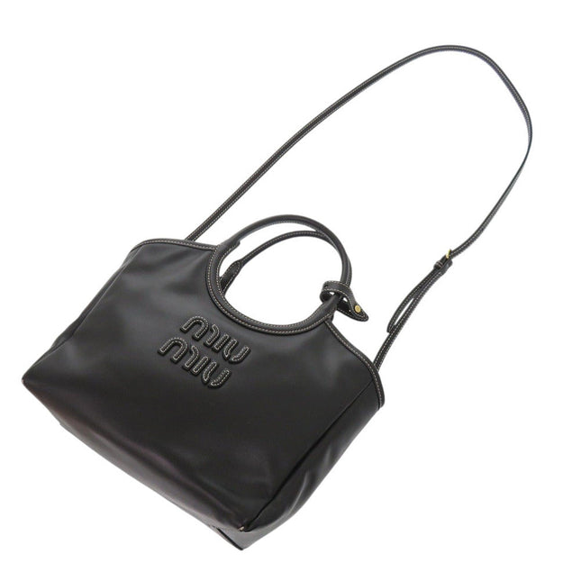 MIU MIU pre-owned black leather handbag with top handles and shoulder strap