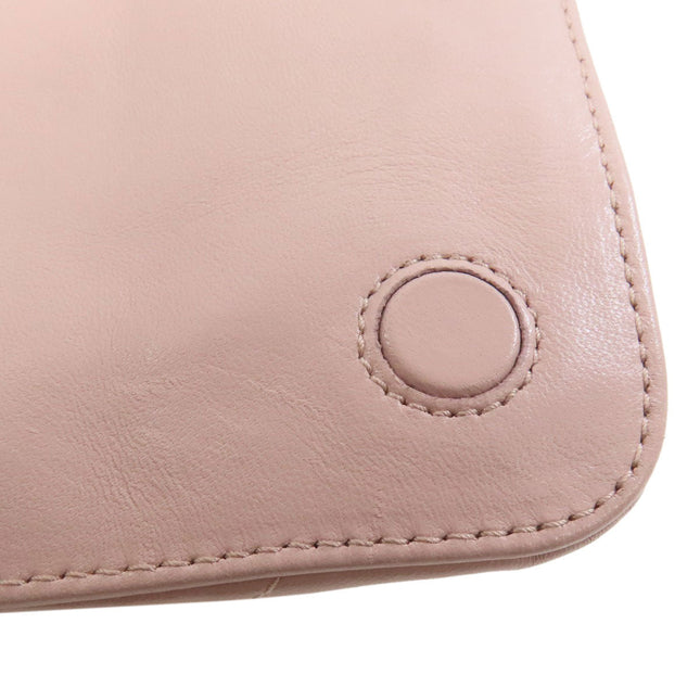Pre-owned MIU MIU leather bag in soft pink with stitched detailing and logo emblem