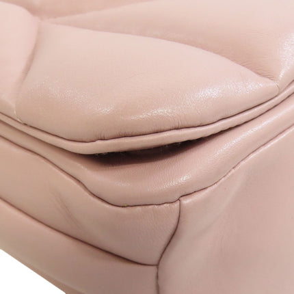 MIU MIU pre-owned quilted leather bag in soft pink with elegant texture and design