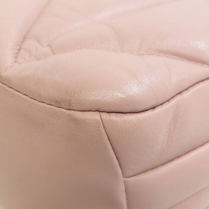 MIU MIU pre-owned blush leather bag with quilted texture and slight wear on the bottom
