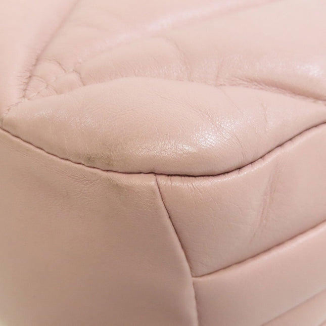 MIU MIU pre-owned blush leather bag with quilted texture and slight wear on the bottom