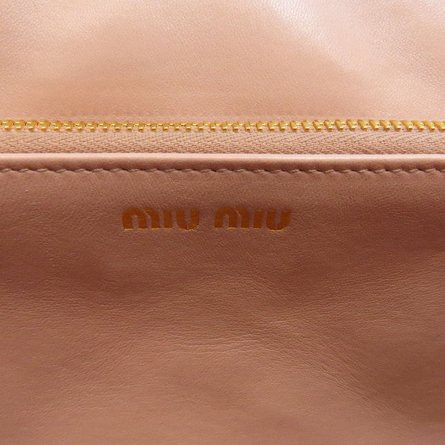 MIU MIU pre-owned bag in soft leather with gold zipper detail and brand logo
