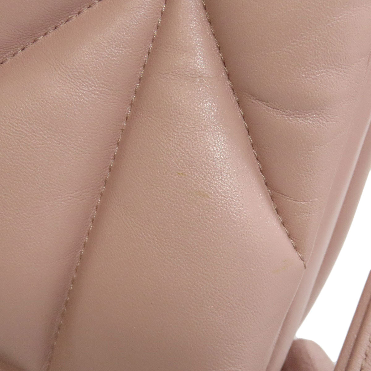MIU MIU pre-owned bag showing soft pink leather and quilted design with subtle wear