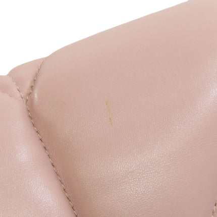 MIU MIU pre-owned bag featuring a subtle pink hue and soft leather texture