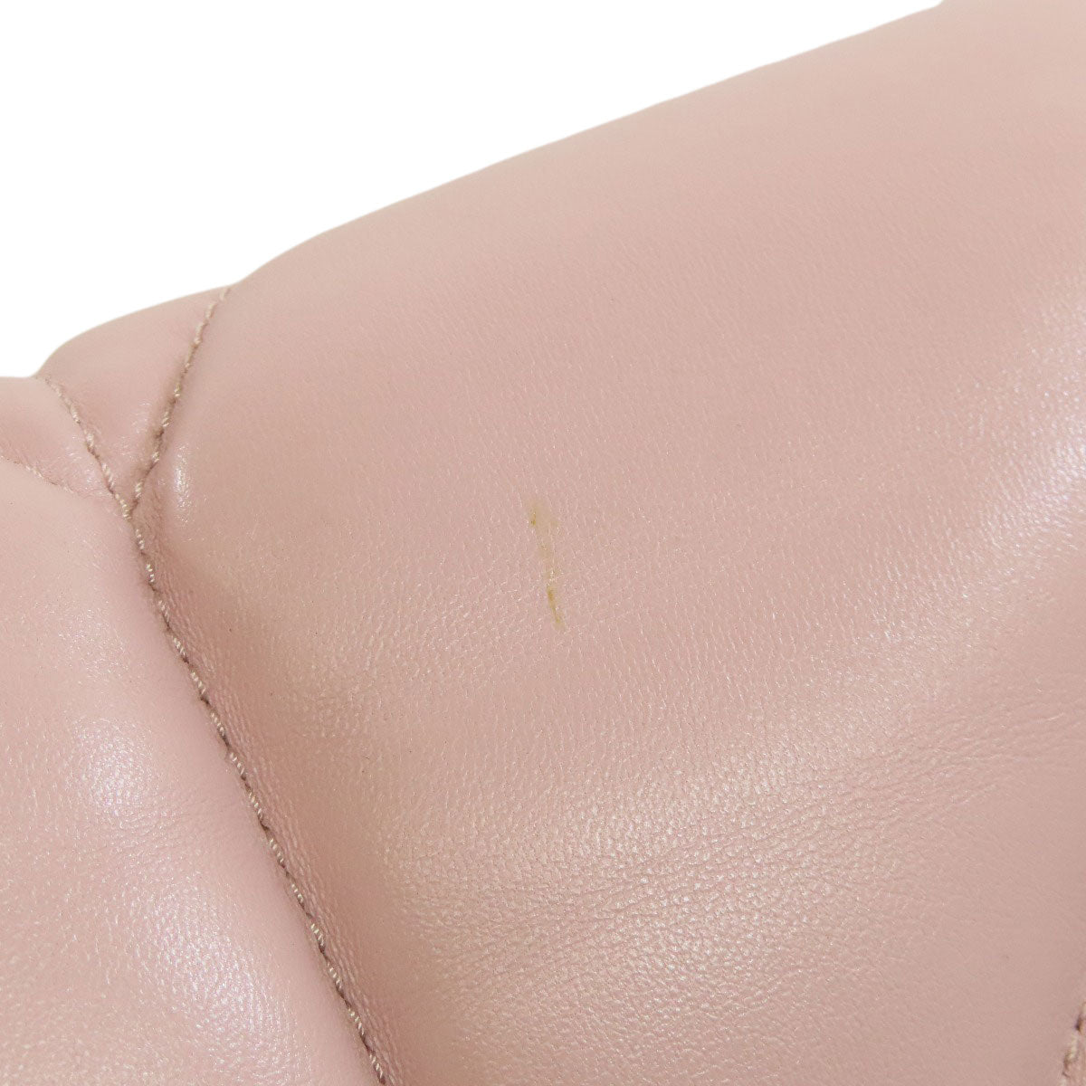 MIU MIU pre-owned bag featuring a subtle pink hue and soft leather texture