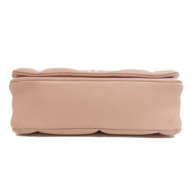 MIU MIU pre-owned pink handbag with soft, quilted design and elegant shape