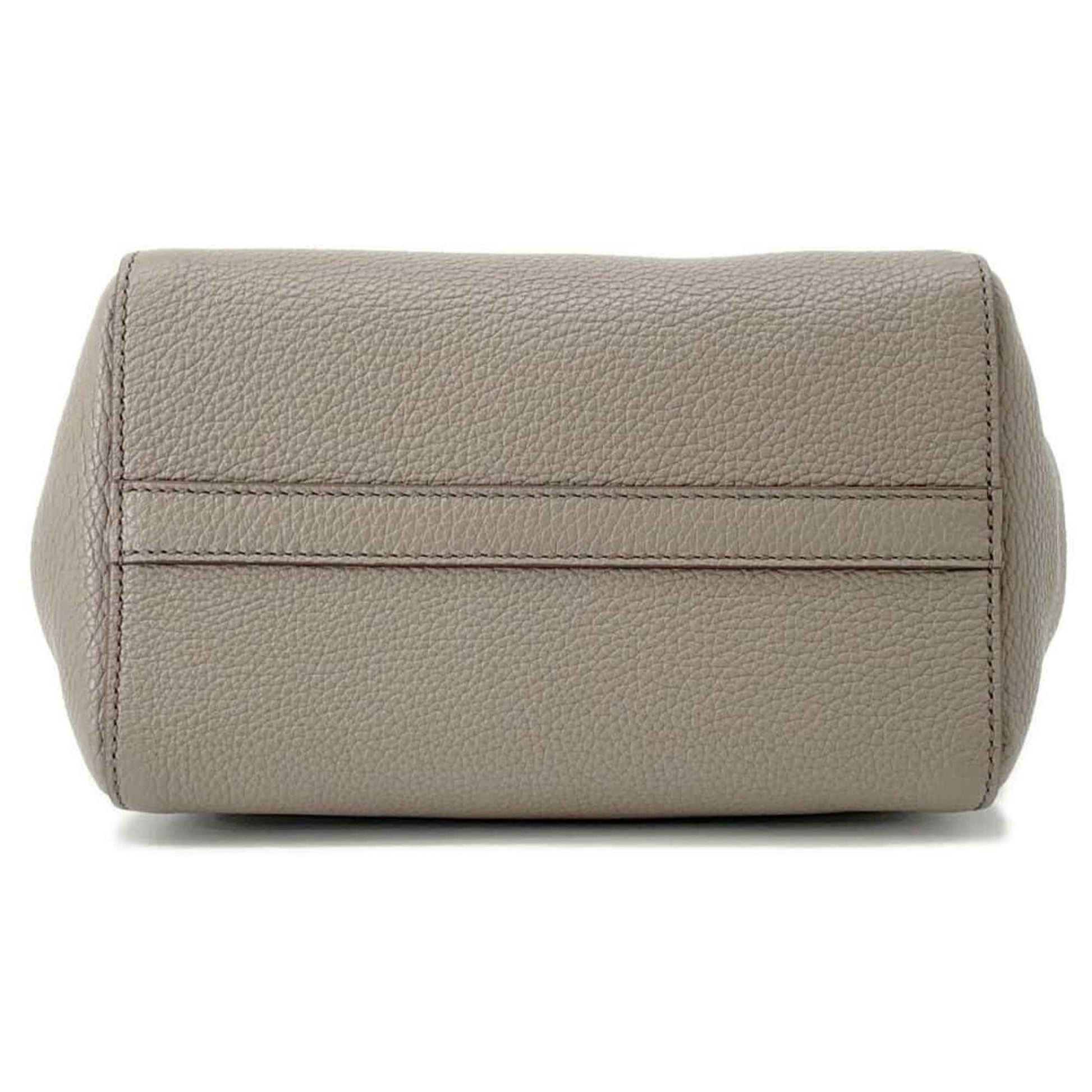 Miu Miu pre-owned leather bag in taupe with a textured finish and understated design