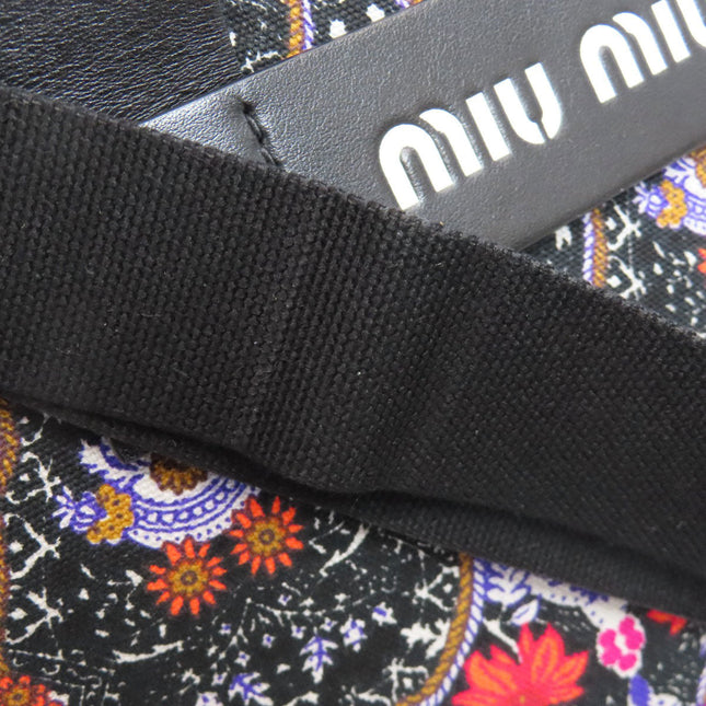 MIU MIU Pre-Owned bag with vibrant floral pattern and durable strap for stylish everyday use