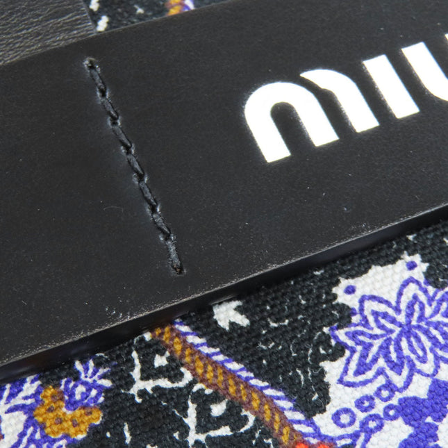 MIU MIU Pre-Owned Floral Print Bag with Durable Leather Straps and Unique Design