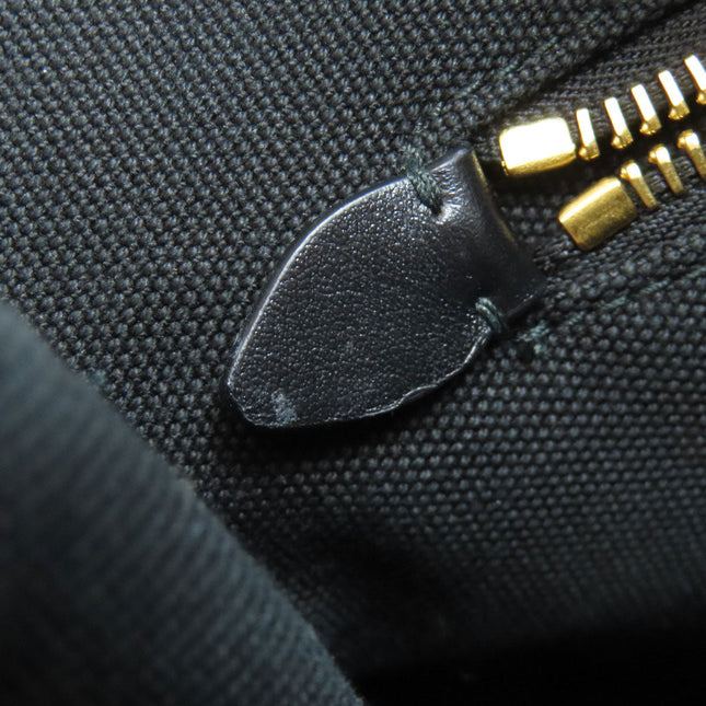 MIU MIU Pre-Owned bag zipper detail showcasing premium craftsmanship and quality materials
