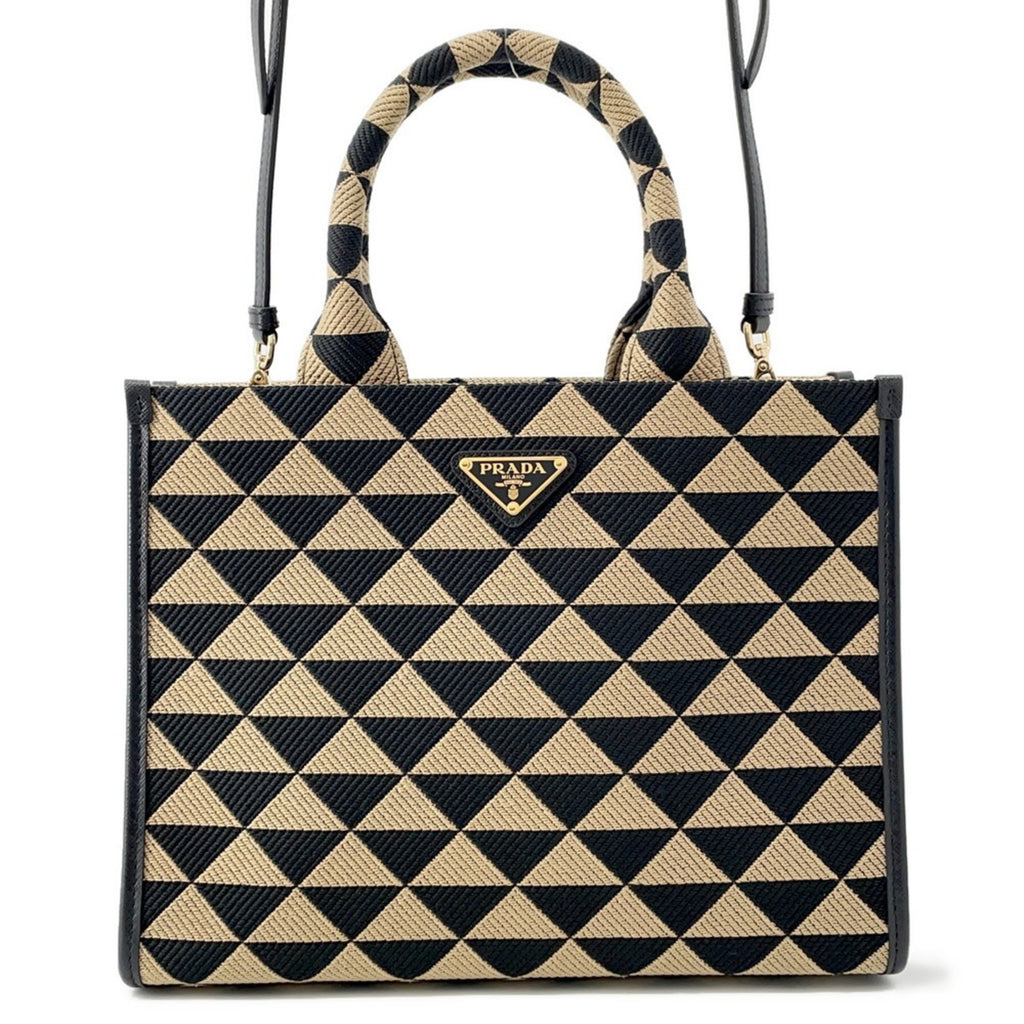 Prada geometric handbag in black and beige with a stylish design for the modern mob wife