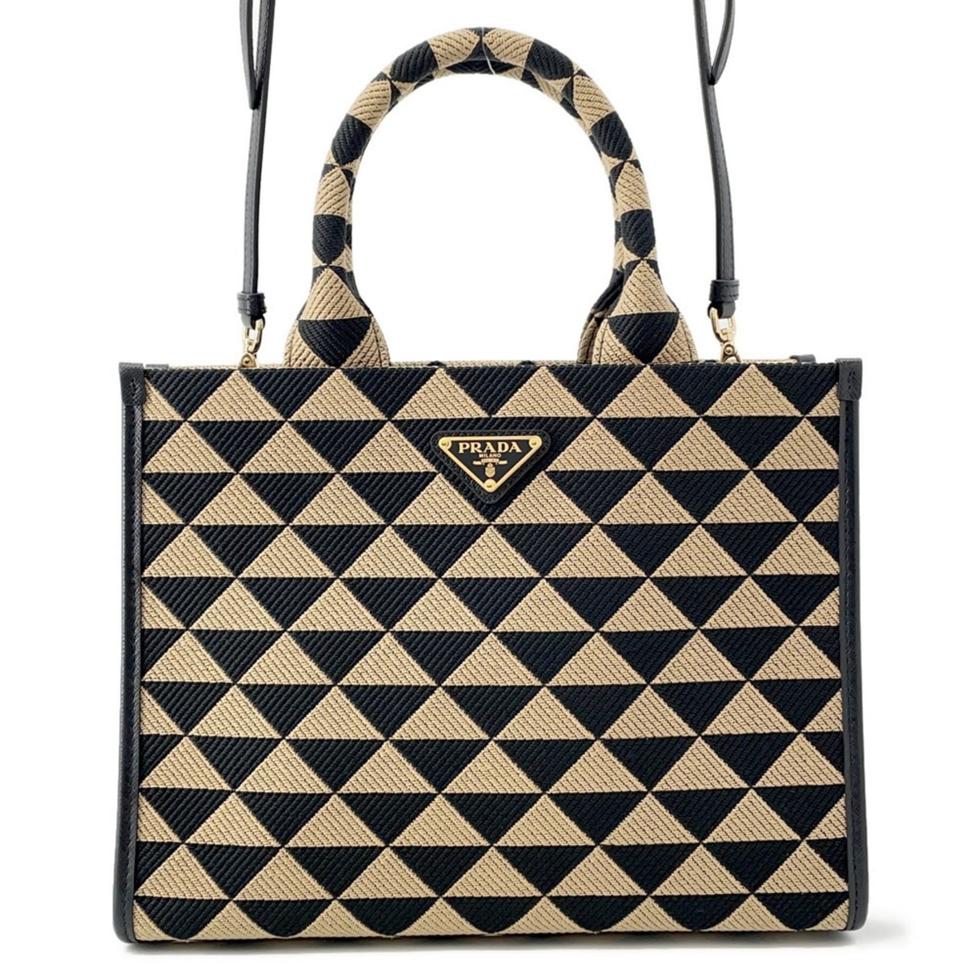 Prada geometric handbag in black and beige with a stylish design for the modern mob wife