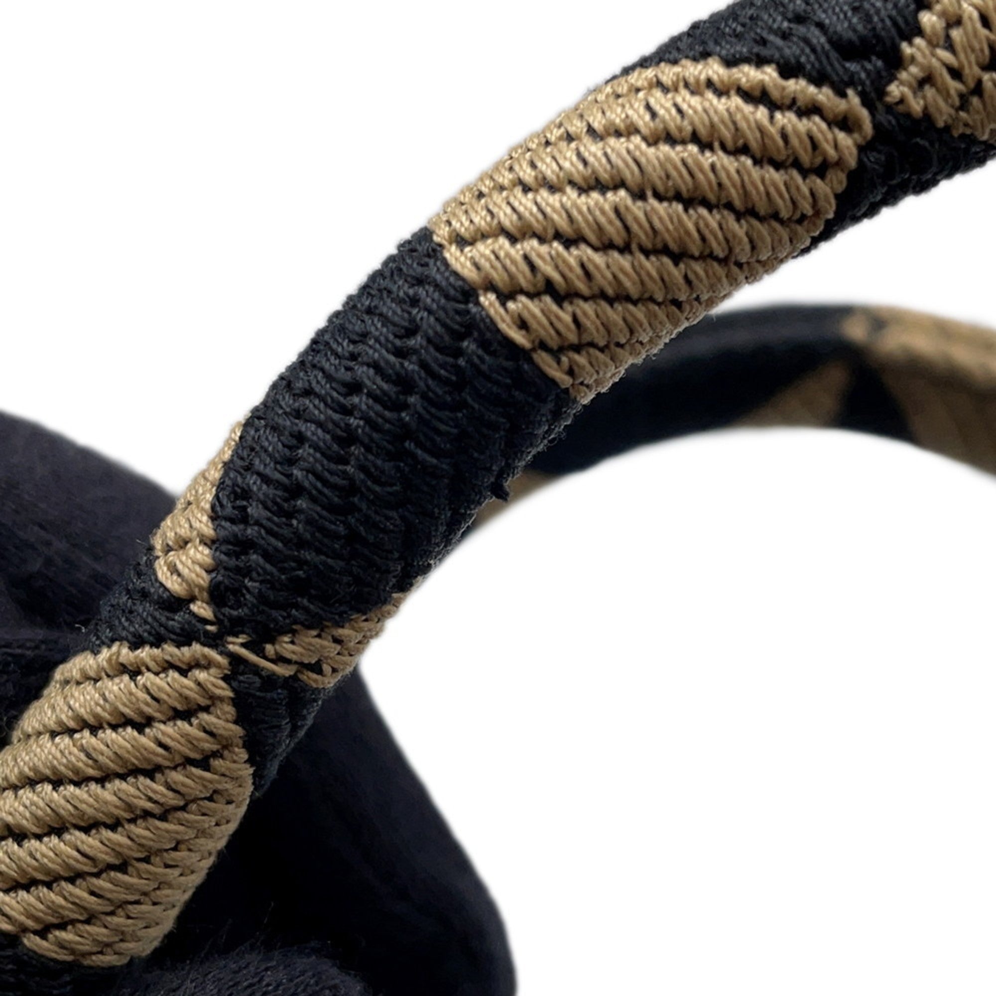 MANSII stylish handbag with intricate braided design inspired by mob wife fashion