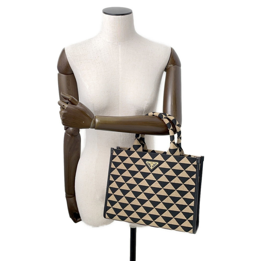 MANSII stylish handbag featuring a geometric design, perfect for the modern mob wife look