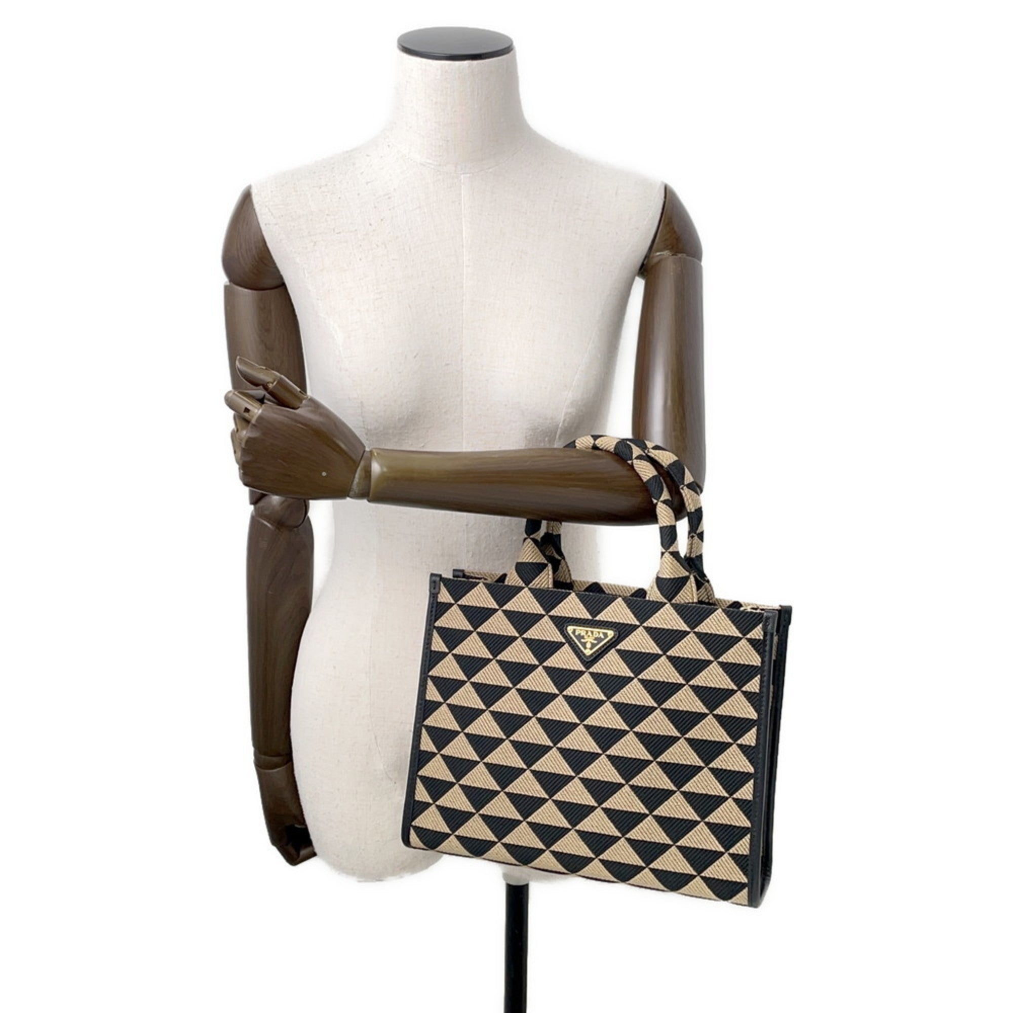 MANSII stylish handbag featuring a geometric design, perfect for the modern mob wife look