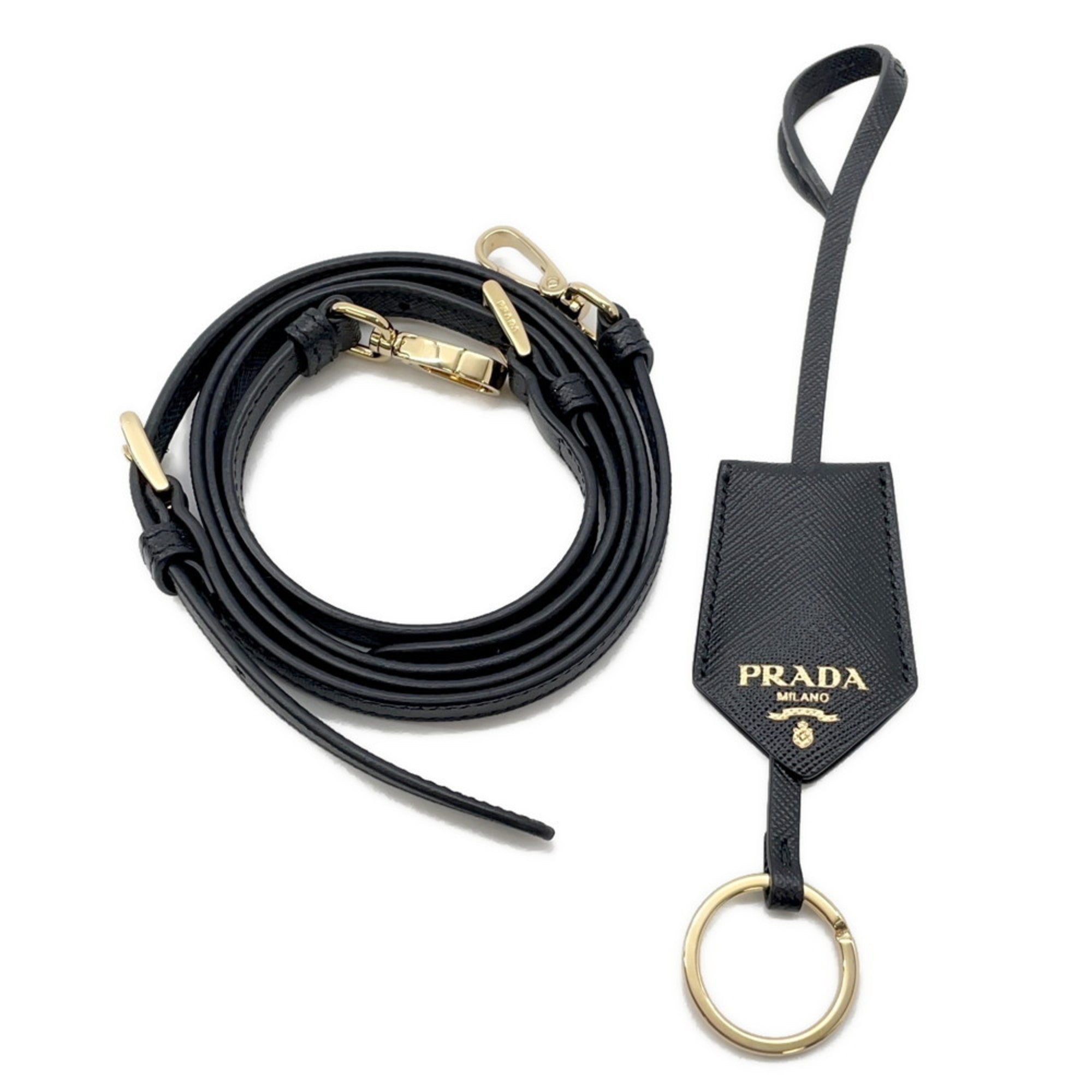 Prada black leather strap with gold hardware, ideal for a chic mob wife look