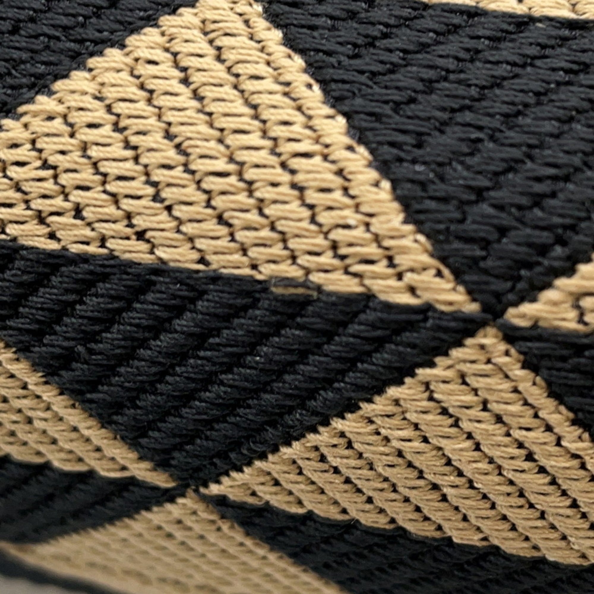 MANSII stylish woven fabric featuring a diamond pattern, perfect for the modern mob wife