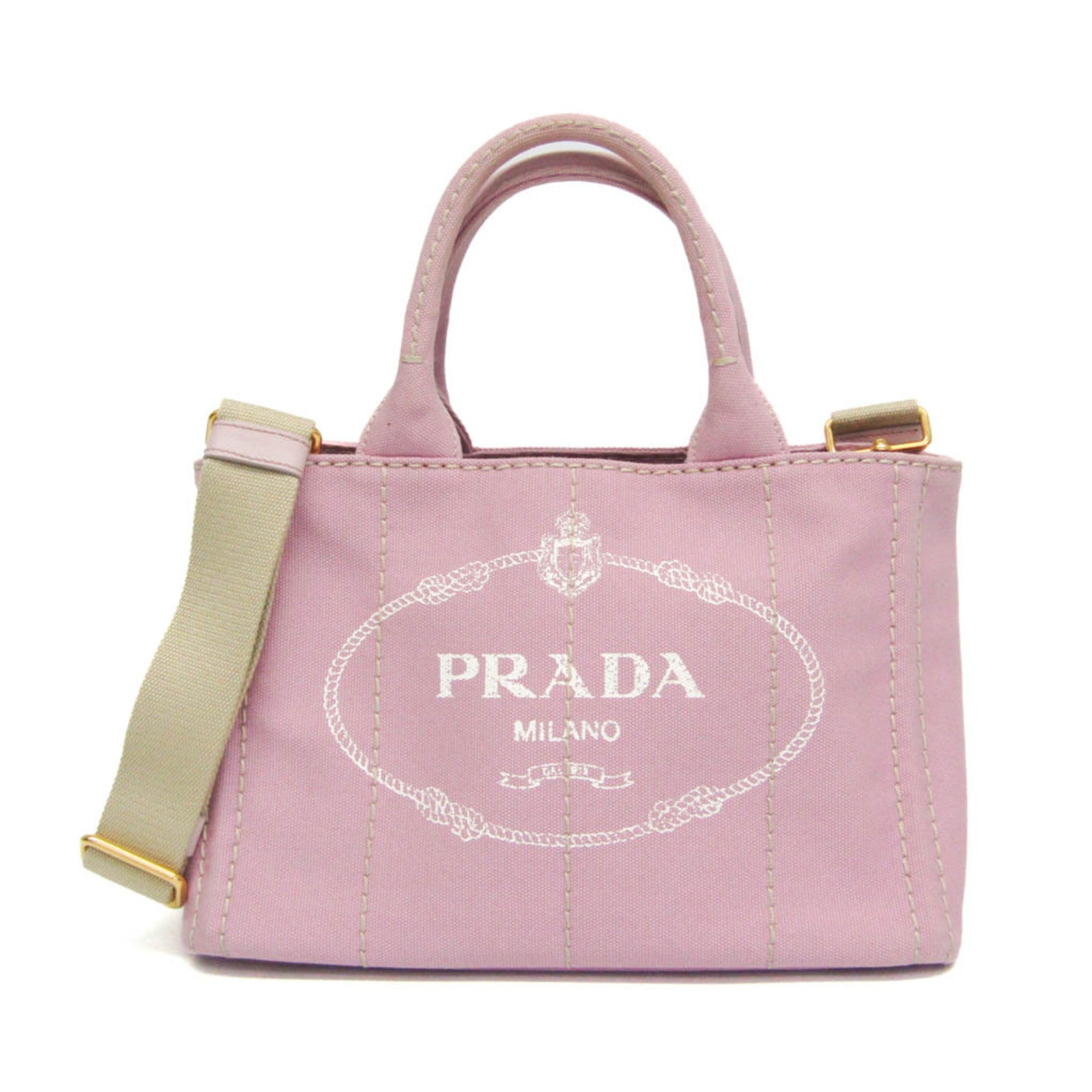 PRADA Pre-Loved Canapa Pink Handbag with Gold Accents and Removable Strap