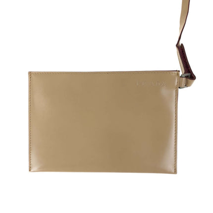 PRADA pre-owned beige leather clutch bag with a wrist strap for stylish occasions