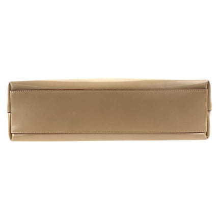 PRADA pre-owned leather bag in beige with a sleek and minimalistic design