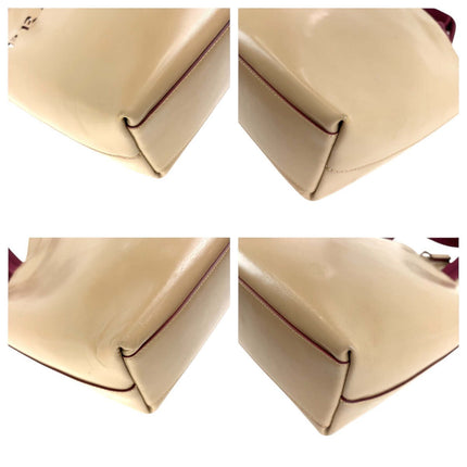 PRADA pre-owned beige leather bag featuring smooth finish and structured design for stylish everyday use