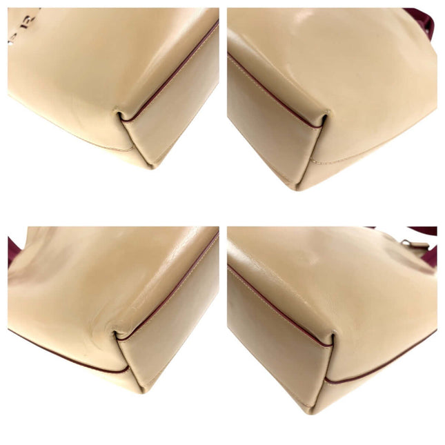 PRADA pre-owned beige leather bag featuring smooth finish and structured design for stylish everyday use