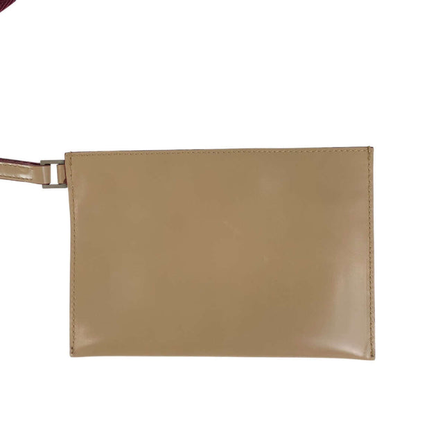PRADA pre-owned tan leather bag with slim design and adjustable strap for versatile use