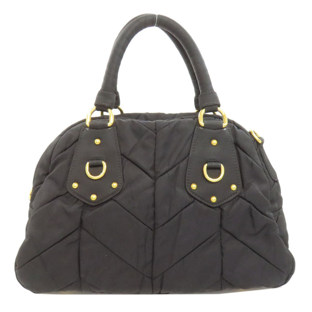 PRADA pre-owned black quilted bag with gold hardware and stylish design