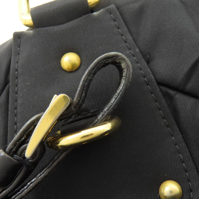 PRADA pre-owned black nylon bag with gold-tone hardware and distinctive quilted design
