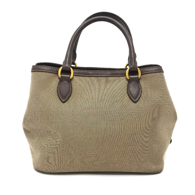 PRADA pre-owned canvas handbag with brown leather handles and gold-tone accents