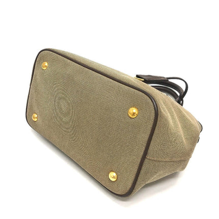 PRADA pre-owned bag with durable canvas material and protective metal feet for stability